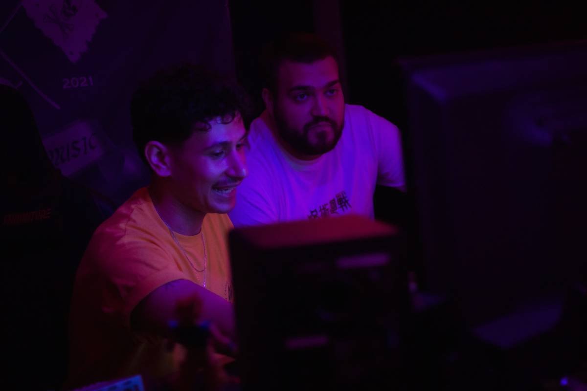 Esports team discussing tactics around a table